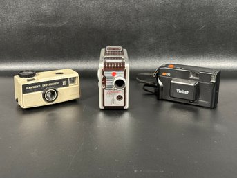 A Grouping Of Vintage Cameras: Brownie 8mm, Kodak Hawkeye & Vivitar 35mm