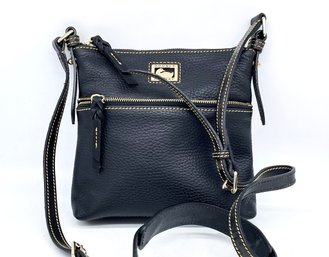 A Leather Purse By Dooney & Bourke