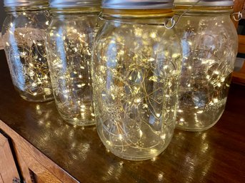 Set Of 9 Mason Jars With Solar Fairy Lights Inside
