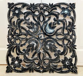 A Carved Wood Wall Plaque