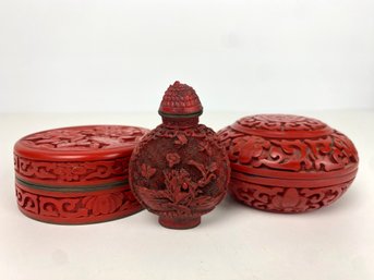 Chinese Cinnabar Style Covered Boxes And A Snuff Bottle