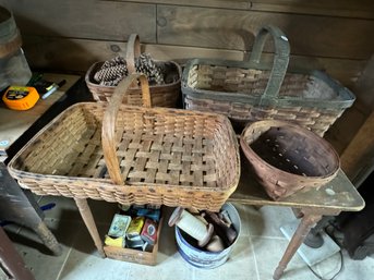 FOUR ANTIQUE BASKETS