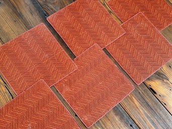 A Set Of Six Woven Placemats
