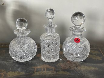 THREE CUT CRYSTAL COLOGNES