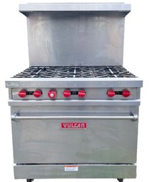 A 6 Burner Vulcan Gas Stove With Built In Hood