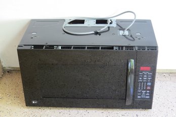 An Over The Range Microwave By LG - In Working Condition