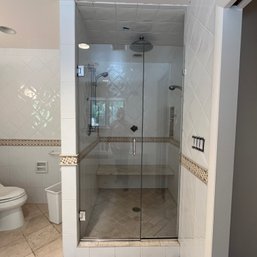 A Frameless Glass Shower Enclosure - Primary Bath
