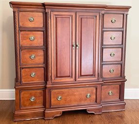 A Large Lighted Paneled Mahogany Dresser By Stanley Furniture