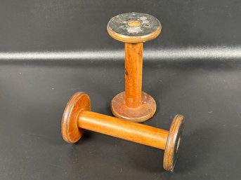 A Pair Of Vintage Wooden Spool Candlesticks