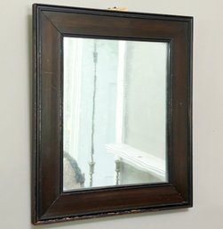 A Mirror In Antique Wood Frame