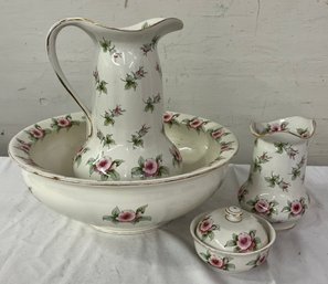 Four Piece Porcelain Pitcher And Bowl Set