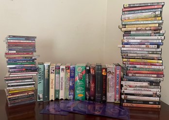 Large Lot Of CD's, DVD's, And VHS Tapes