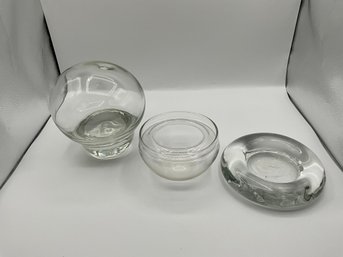 Set/3 Glass Pieces Including A Pillar Candle Holder & Glass Sculpture With A Hole For A Flower