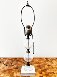 A Vintage Glass Lamp On Marble Base