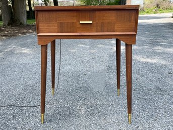 A Vintage Singer Sewing Machine On Vintage Mid Century Sewing Machine Table