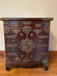 BRASS BOUND CHINESE CABINET, TWO DRAWERS OVER TWO DOORS