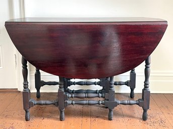 An Antique Mahogany Gate Leg Drop Leaf Table