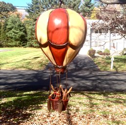 A Fun Decorative Resin Hot Air Balloon With Figures