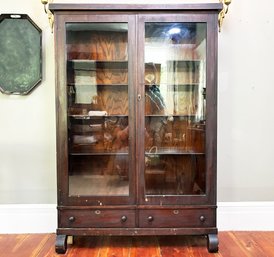 An Early 1900's Walnut Bookcase Or China Cabinet From A.I. Namm And Son 'Brooklyn's Great Underselling Store!'