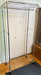 A Hanging Closet Rack - On Wheels For Ease Of Movement - One Bar