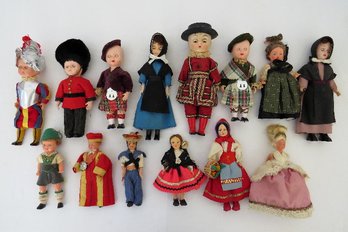 A Grouping Of Dolls From Around The World - Some Sleepy Eyed