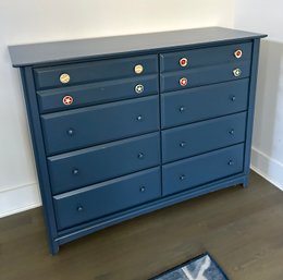 Navy Dresser With Decorative Knobs