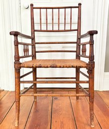 A British Arts & Crafts Sussex Chair With Cane Seat