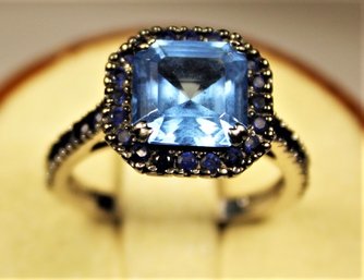 Sterling Silver Blue Topaz Gemstone Ring Having Sapphires Size 7