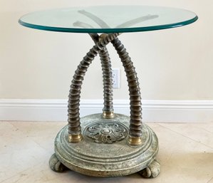 A Glass Top Side Table With Gilt Tusk Form Base