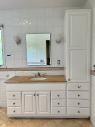 A Stone Top Wood Vanity By Bertch With Tall Cupboard - Bath 2