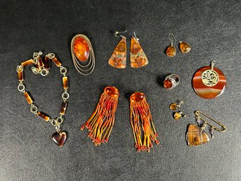 A Striking Selection Of Vintage Jewelry With Tiger's Eye, Amber & More