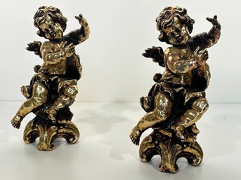 A Pair Of Gilt Ceramic Angels