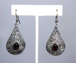 Very Fine And Large Fancy Sterling Silver Pierced Earrings Having Genuine Garnet Stones