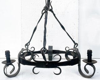 A Rustic Wrought Iron Chandelier