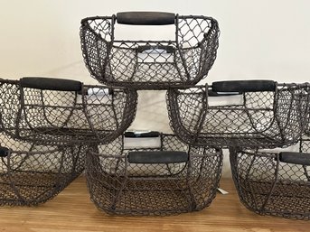 A Set Of Eight Modern Farmhouse Chic Wire Baskets
