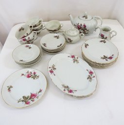 A Mixed Lot Of Tea Rose Pattern China Pieces