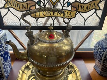 A VICTORIAN BRASS KETTLE ON STAND