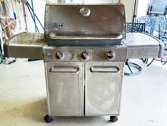 A Weber Genesis Propane Grill