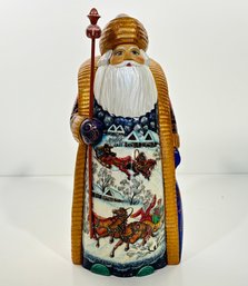 A Hand Carved And Painted Russian Santa