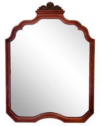 An Antique Carved Mahogany Mirror