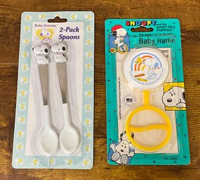 Set Of Baby Spoons And A Baby Rattle