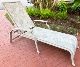 A Fine Quality Cast Aluminum And Mesh Lounge Chair