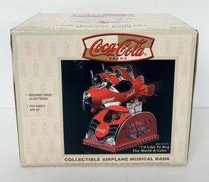 Brand New Coca Cola Collectible Airplane Musical Bank