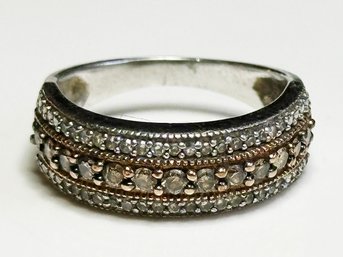 A Sterling Silver And 10K Gold Ring