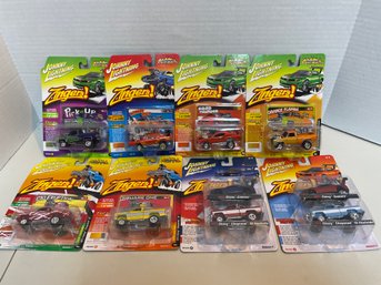 8  X Johnny Lightning  -zingers. Total Of 10 Cars (#132)