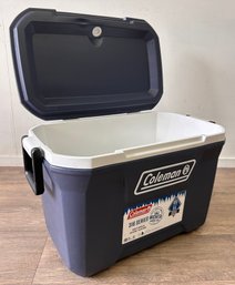 Coleman Cooler With Drain Spout And Drink Holders On Top