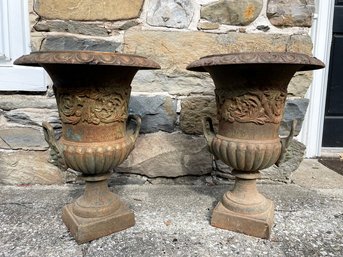 A Pair Of Antique Cast Iron Urns