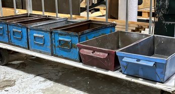 A Collection Of Painted Industrial Steel Storage Bins