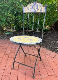 A Pique Assiette And Wrought Iron Garden Seat