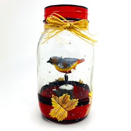 Bird In A Glass Jar